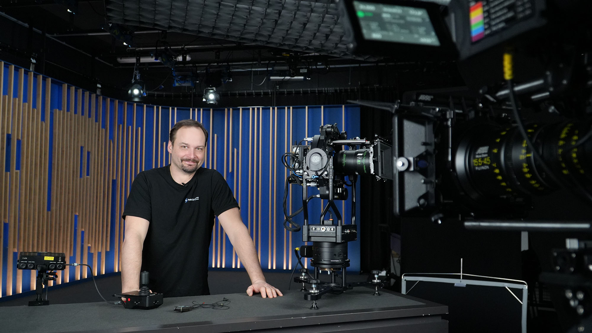 Alex Voigt next to Trinity 2 pan axis module