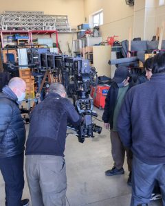 Attendees interacting with FoMa Antares remote head during Japan demo