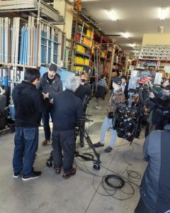 Group of professionals interacting with FoMa Antares during Japanese event