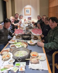group picture of alex voigt together with japanese colleagues