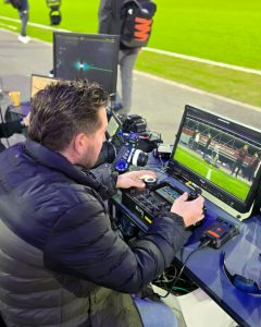 man-sitting-next-to-foma-rcp-2-evo-remote-control