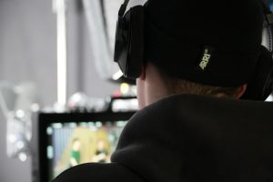 man with branded ARRI headphones